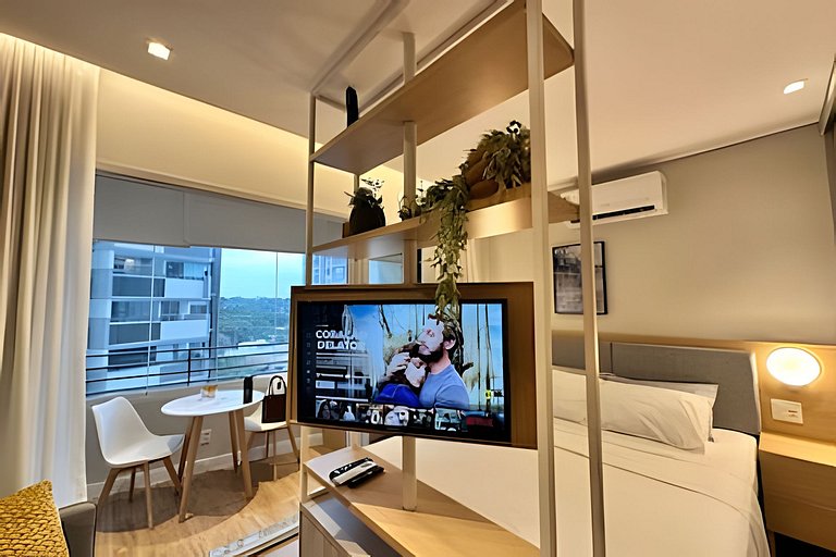 Studio com garagem, piscina e self check-in