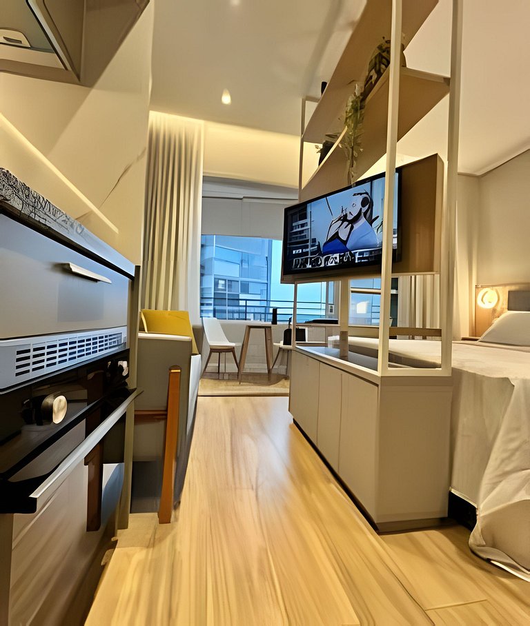 Studio com garagem, piscina e self check-in