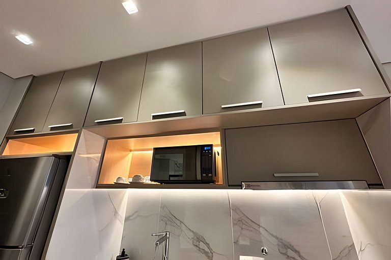 Studio com garagem, piscina e self check-in