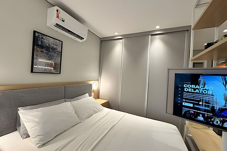 Studio com garagem, piscina e self check-in