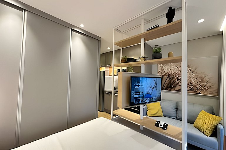 Studio com garagem, piscina e self check-in