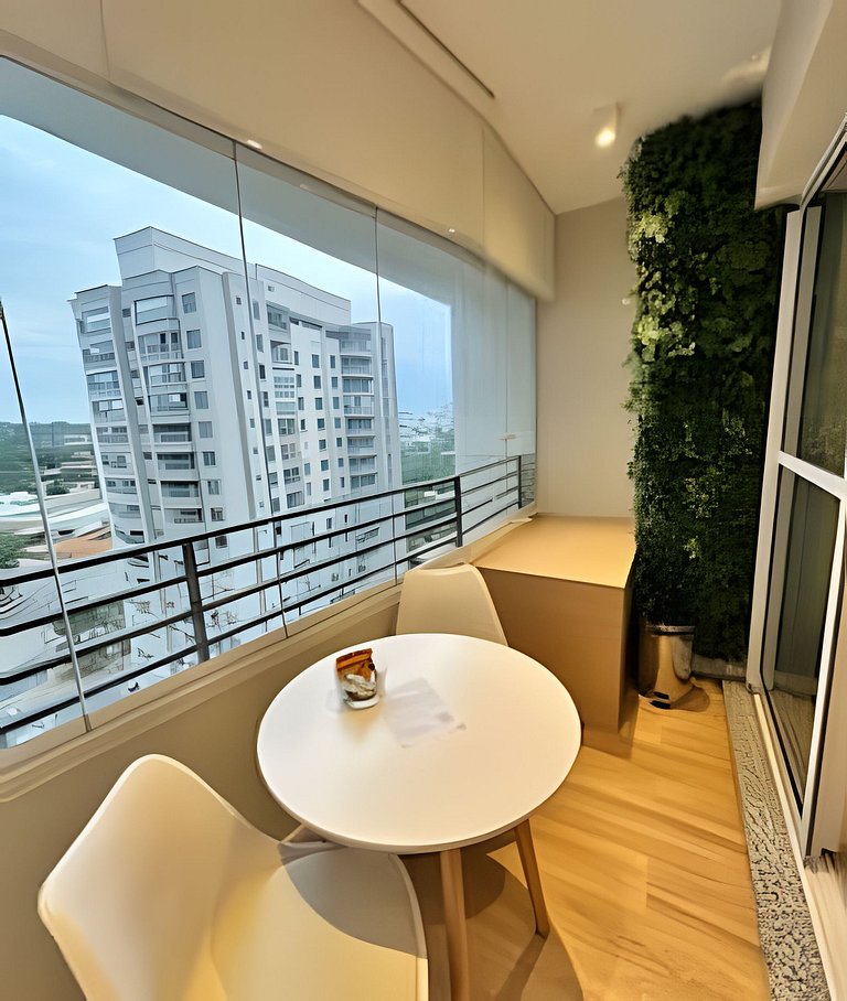 Studio com garagem, piscina e self check-in