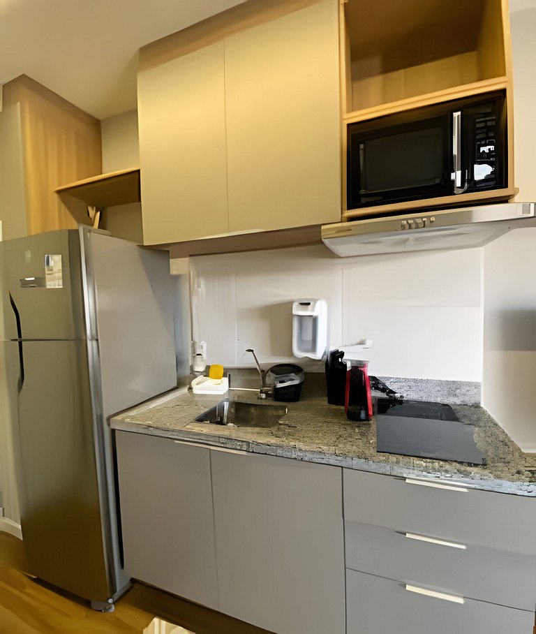 1607 - Studio c/garagem na melhor localização