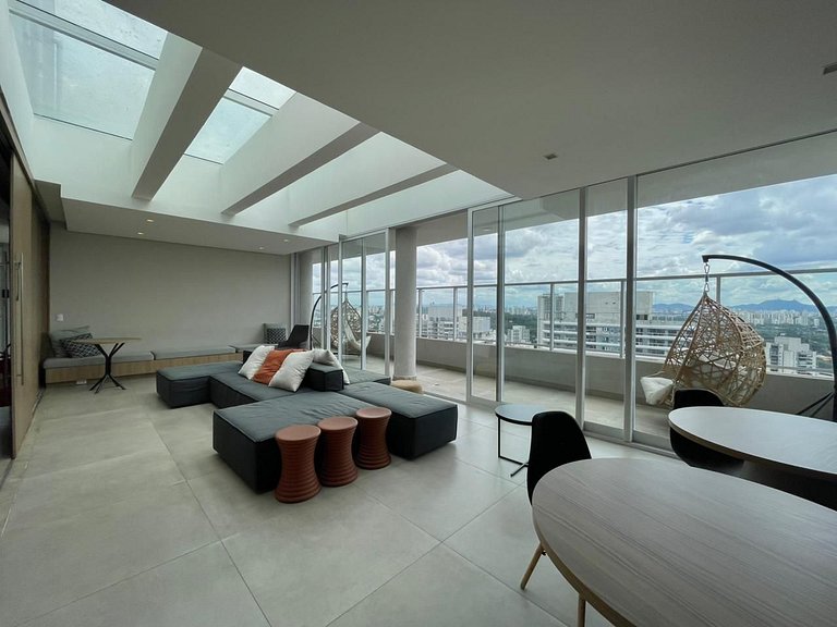 Studio com garagem, piscina e self check-in