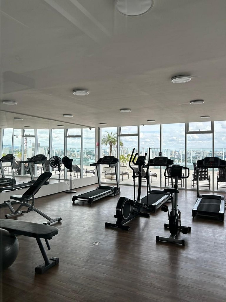 Studio com garagem, piscina e self check-in